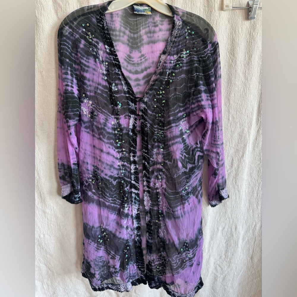 Purple and black swim coverup with sequin edge designs